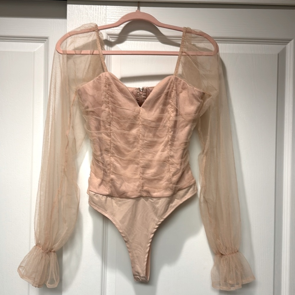 Fashion nova pink bodysuit with sheer pink long sleeves, size large.
